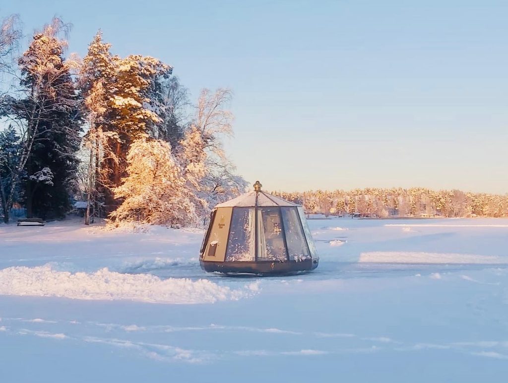 Snowmobile and accommodation in a glass igloo Helsinki